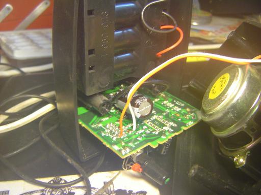 Speaker circuit board with installed cap